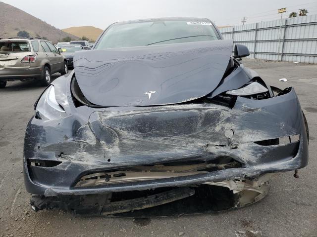 Photo 5 from auction – 2022 TESLA MODEL Y with VIN 7SAYGDEF1NF457494