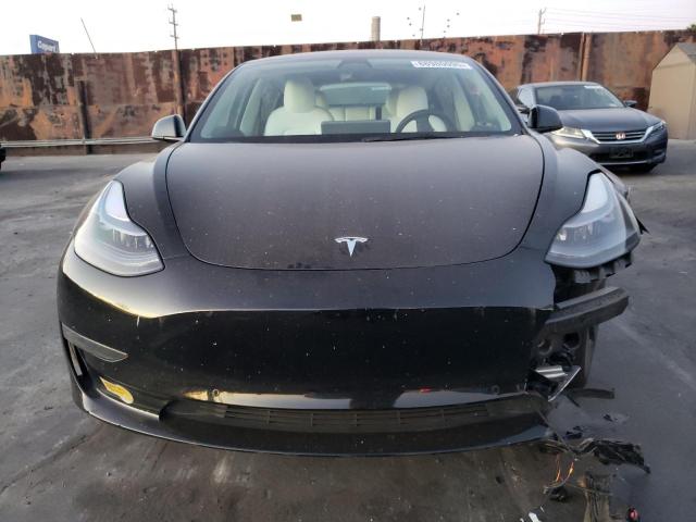 Photo 5 from auction – 2022 TESLA MODEL 3 with VIN 5YJ3E1EA0NF197329