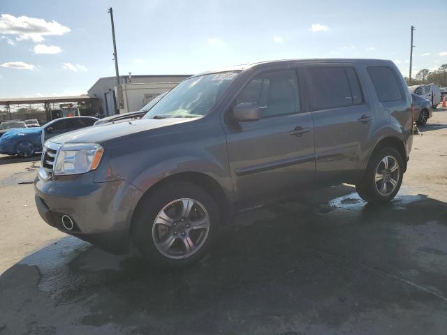 HONDA PILOT SE 2015 with VIN 5FNYF3H3XFB034782 - Photo from auction