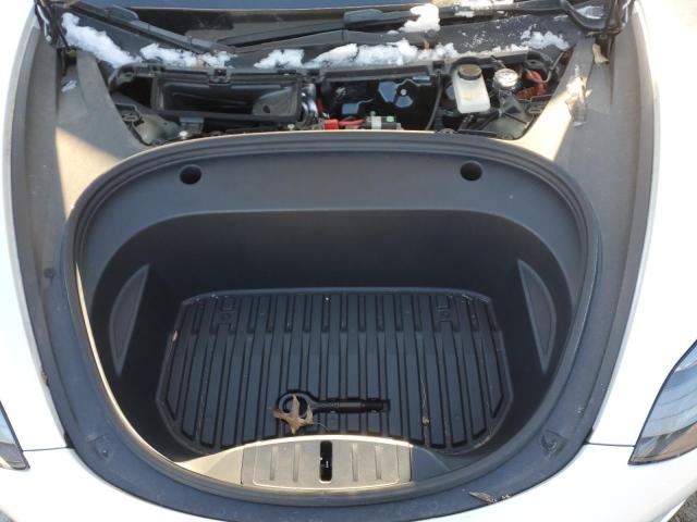 Photo 11 from auction – 2022 TESLA MODEL 3 with VIN 5YJ3E1EB3NF184275