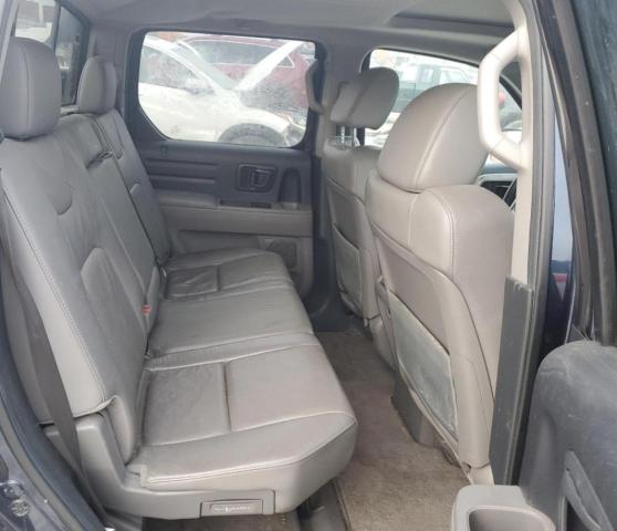 Photo 11 from auction – 2010 HONDA RIDGELINE with VIN 5FPYK1F51AB004493