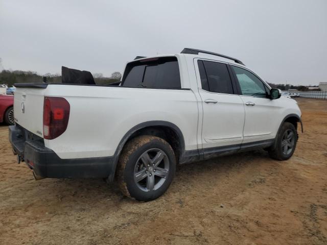 Photo 3 from auction – 2022 HONDA RIDGELINE with VIN 5FPYK3F77NB002010