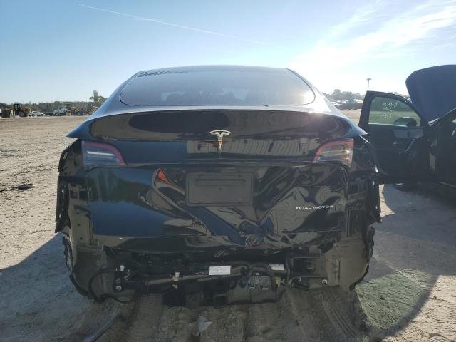 Снимка 6 от търг – 2023 TESLA MODEL Y с VIN 7SAYGAEE6PF805153