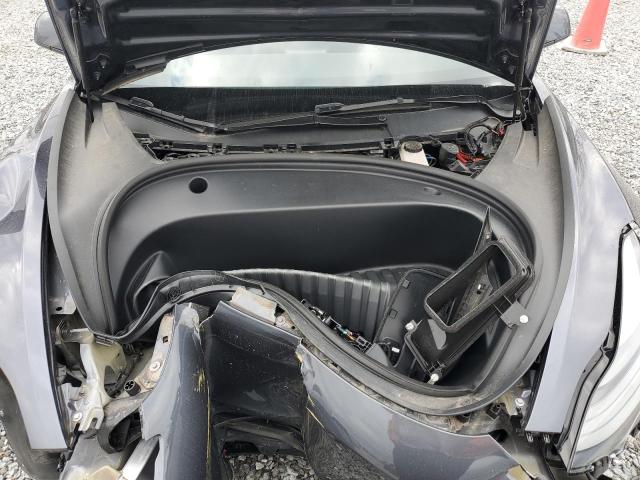 Photo 11 from auction – 2023 TESLA MODEL 3 with VIN 5YJ3E1EB3PF665162