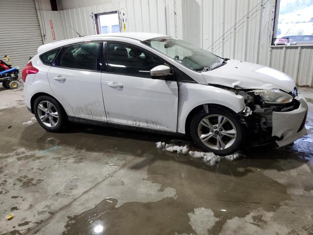 Foto 4 de la subasta – 2014 FORD FOCUS SE con VIN 1FADP3K26EL438093