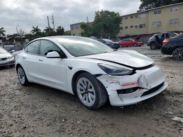 Photo 4 from auction – 2021 TESLA MODEL 3 with VIN 5YJ3E1EBXMF063127