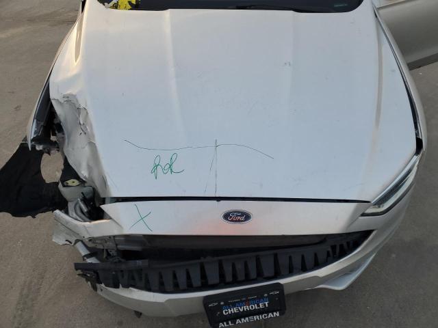 Photo 11 from auction – 2018 FORD FUSION TIT with VIN 3FA6P0D91JR168218