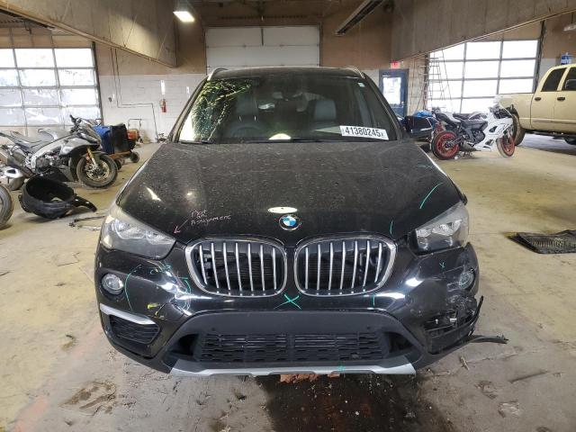Photo 5 from auction – 2016 BMW X1 XDRIVE2 with VIN WBXHT3C38G5E48989