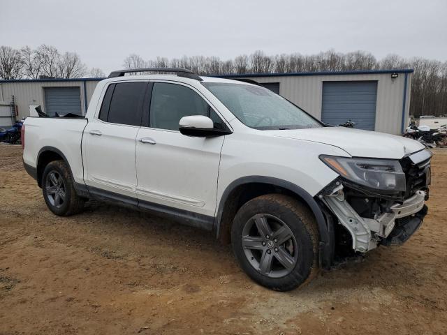 Photo 4 from auction – 2022 HONDA RIDGELINE with VIN 5FPYK3F77NB002010