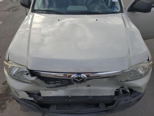 Photo 12 from auction – 2008 MAZDA TRIBUTE S with VIN 4F2CZ06108KM19937