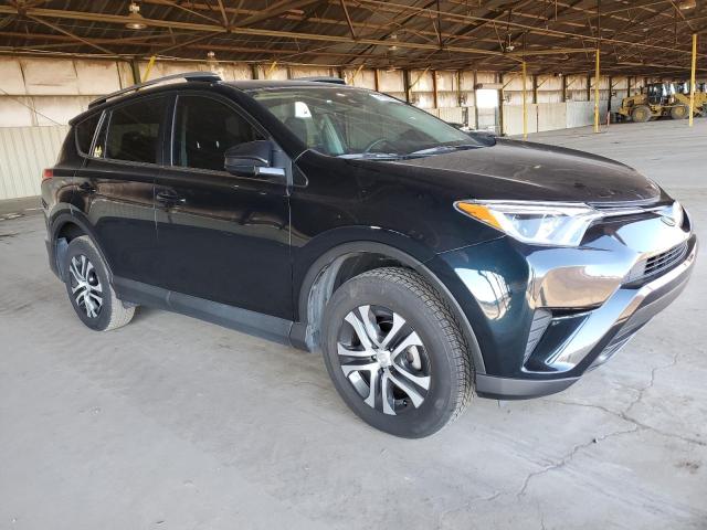 Photo 4 from auction – 2018 TOYOTA RAV4 LE with VIN 2T3ZFREV5JW422681