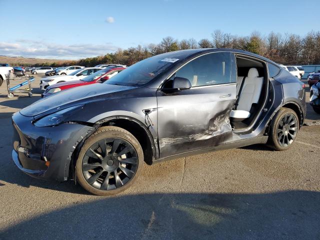 TESLA MODEL Y 2024 with VIN 7SAYGDEE3RA239454 - Photo from auction