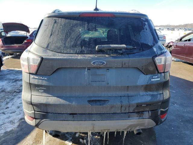 Photo 6 from auction – 2018 FORD ESCAPE SE with VIN 1FMCU0GD6JUA31270