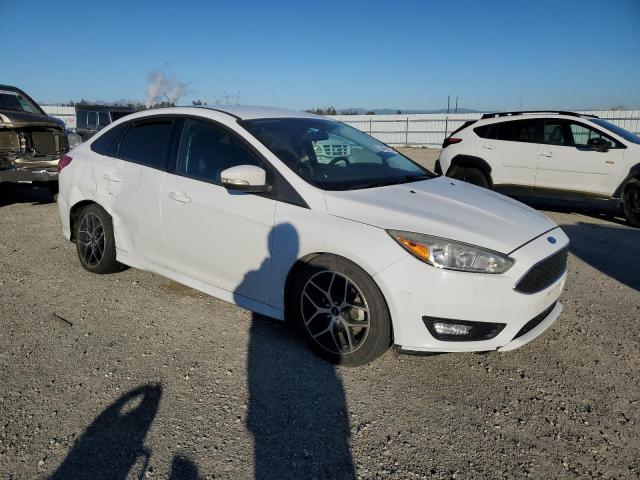 Снимка 4 от търг – 2016 FORD FOCUS SE с VIN 1FADP3F29GL276196