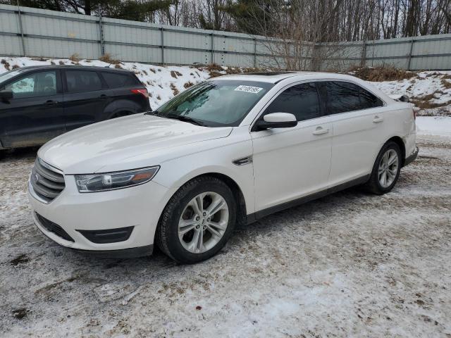 FORD TAURUS SEL 2017 with VIN 1FAHP2E80HG138753 - Photo from auction