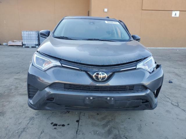 Photo 5 from auction – 2018 TOYOTA RAV4 LE with VIN 2T3ZFREV7JW458646