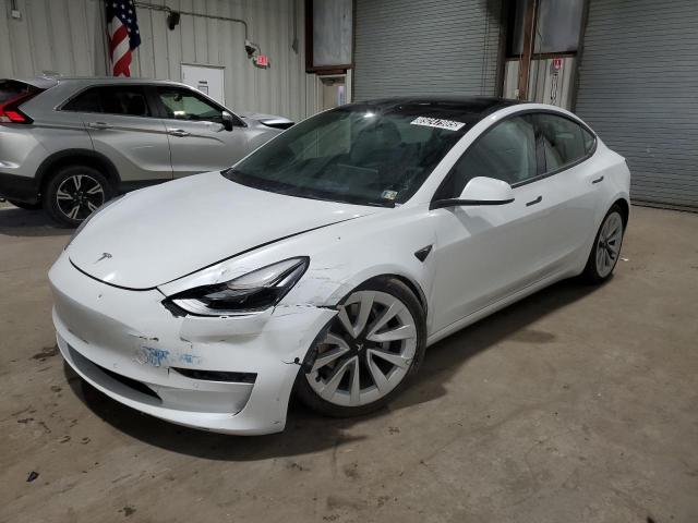 TESLA MODEL 3 2022 with VIN 5YJ3E1EB8NF288082 - Photo from auction