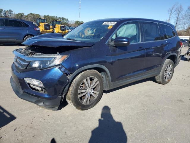 HONDA PILOT EXL 2017 with VIN 5FNYF5H56HB031667 - Photo from auction