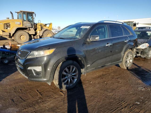 KIA SORENTO SX 2011 with VIN 5XYKWDA22BG122838 - Photo from auction