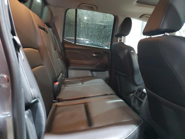 Photo 10 from auction – 2023 HONDA RIDGELINE with VIN 5FPYK3F5XPB067628
