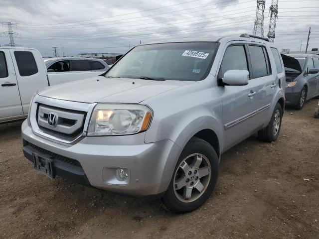 HONDA PILOT TOUR 2010 with VIN 5FNYF4H90AB033918 - Photo from auction