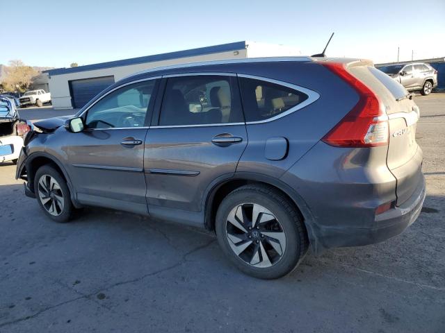 Photo 2 from auction – 2016 HONDA CR-V TOURI with VIN 5J6RM4H93GL058418