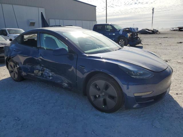 Photo 4 from auction – 2023 TESLA MODEL 3 with VIN 5YJ3E1EA6PF674994