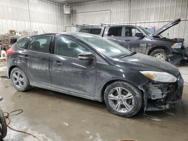 Photo 4 from auction – 2014 FORD FOCUS SE with VIN 1FADP3K27EL457218