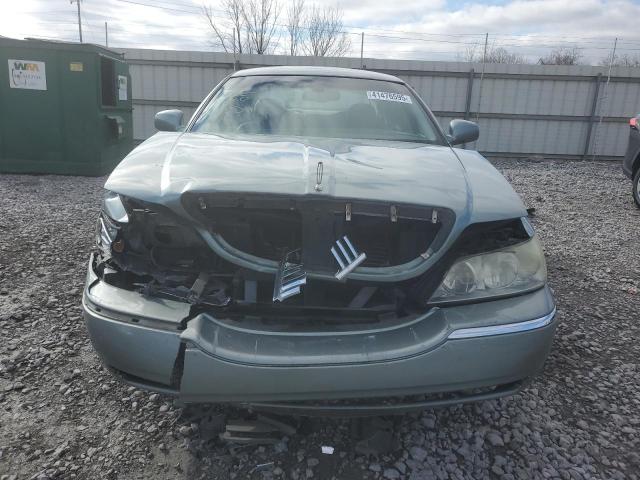 Photo 5 from auction – 2004 LINCOLN TOWN CAR E with VIN 1LNHM81W04Y626028