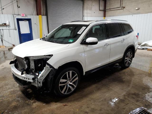 HONDA PILOT TOUR 2016 with VIN 5FNYF6H95GB126003 - Photo from auction