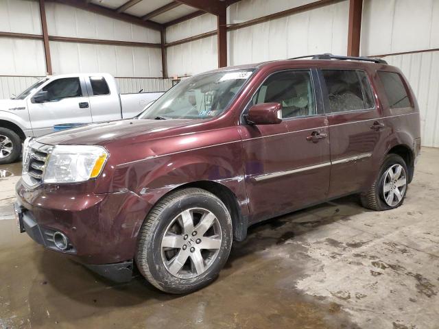 HONDA PILOT TOUR 2014 with VIN 5FNYF4H96EB039874 - Photo from auction