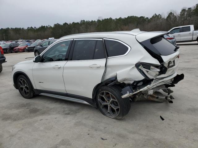 Photo 2 from auction – 2016 BMW X1 XDRIVE2 with VIN WBXHT3C31G5E50647