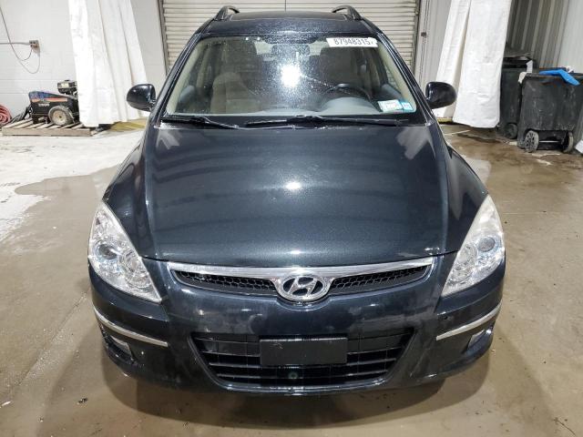 Photo 5 from auction – 2010 HYUNDAI ELANTRA with VIN KMHDC8AE2AU063351