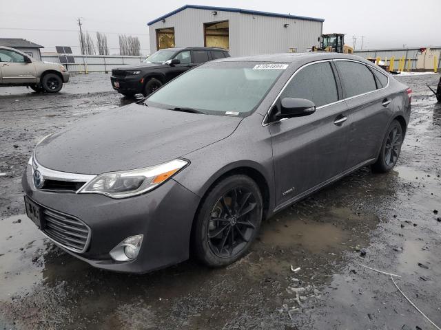 TOYOTA AVALON HYB 2014 with VIN 4T1BD1EB3EU027864 - Photo from auction