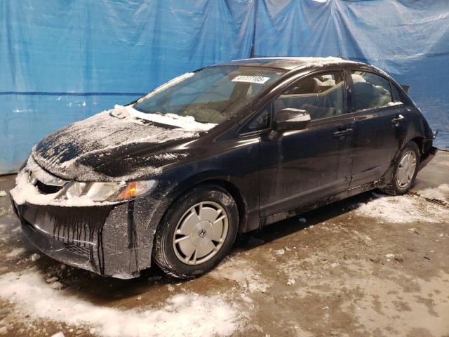 HONDA CIVIC HYBR 2010 with VIN JHMFA3F24AS005384 - Photo from auction