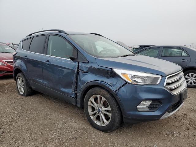 Photo 4 from auction – 2018 FORD ESCAPE SE with VIN 1FMCU9GD2JUB99024