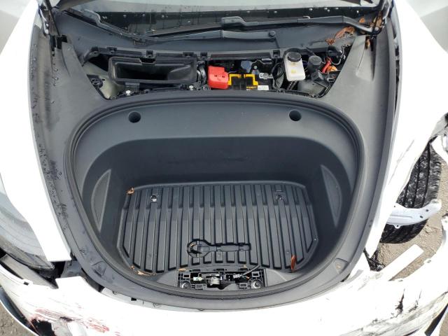 Photo 11 from auction – 2021 TESLA MODEL 3 with VIN 5YJ3E1EBXMF063127