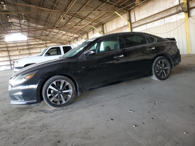 NISSAN ALTIMA 2.5 2018 with VIN 1N4AL3AP7JC131330 - Photo from auction