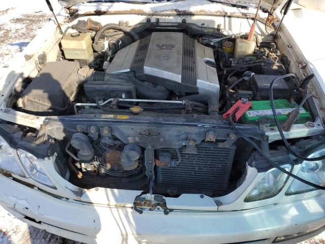 Photo 12 from auction – 2000 LEXUS LX 470 with VIN JT6HT00W3Y0099818