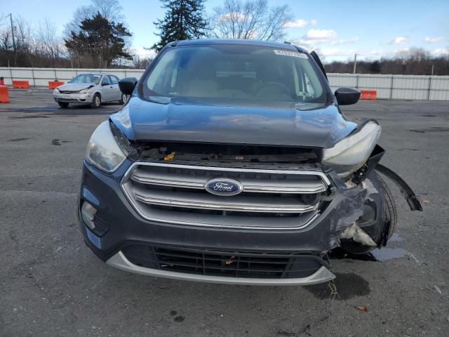 Photo 5 from auction – 2017 FORD ESCAPE SE with VIN 1FMCU9GD4HUE45209
