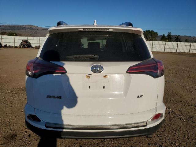 Photo 6 from auction – 2018 TOYOTA RAV4 LE with VIN JTMZFREV4JJ210868