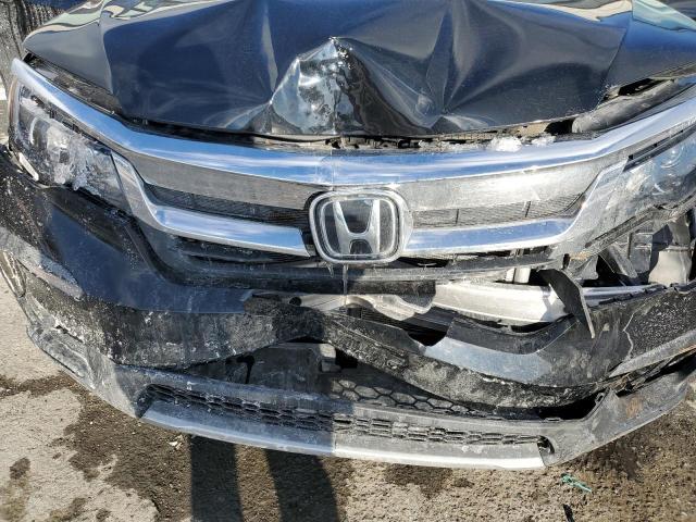 Photo 12 from auction – 2021 HONDA PILOT EXL with VIN 5FNYF6H54MB047480