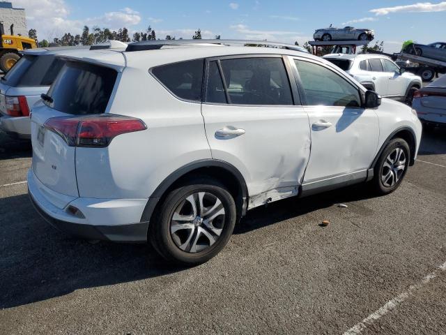 Photo 3 from auction – 2017 TOYOTA RAV4 LE with VIN JTMZFREV8HJ113991