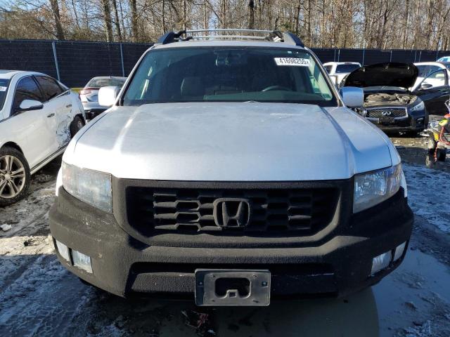 Photo 5 from auction – 2014 HONDA RIDGELINE with VIN 5FPYK1F63EB014506