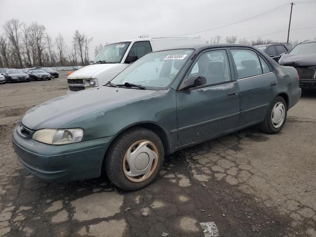 TOYOTA COROLLA VE 2000 with VIN 1NXBR12E5YZ390364 - Photo from auction