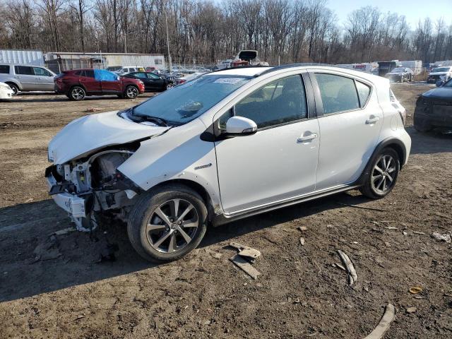 TOYOTA PRIUS C 2018 with VIN JTDKDTB30J1604360 - Photo from auction