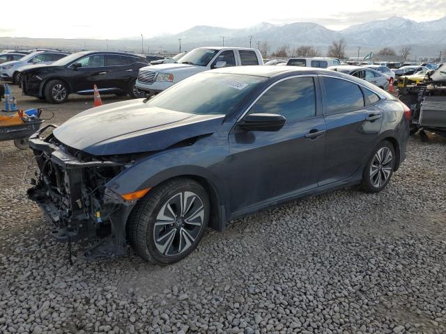HONDA CIVIC EXL 2017 with VIN 2HGFC1F74HH653063 - Photo from auction