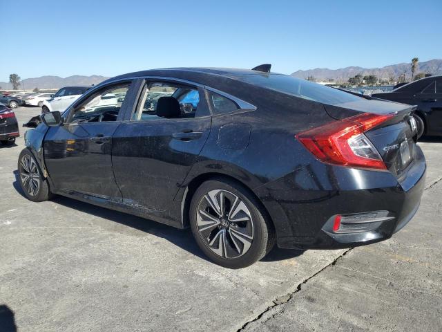 Photo 2 from auction – 2018 HONDA CIVIC EX with VIN JHMFC1F35JX014282
