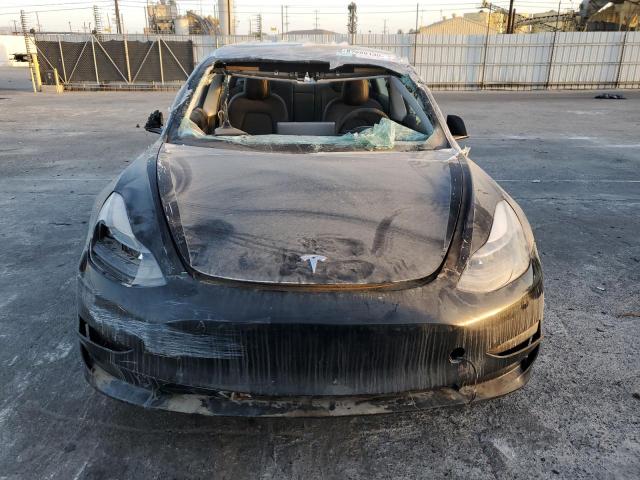 Photo 5 from auction – 2023 TESLA MODEL 3 with VIN 5YJ3E1EA3PF557633