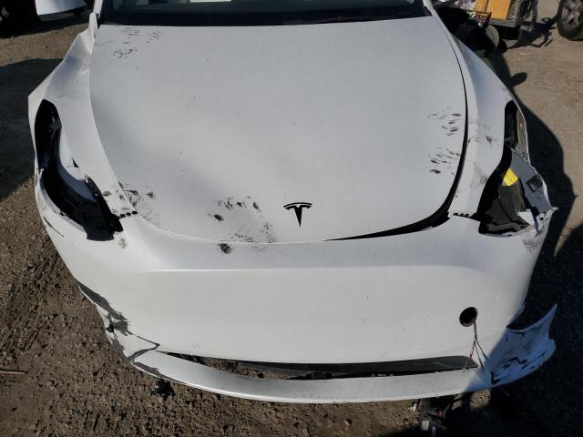 Снимка 11 от търг – 2022 TESLA MODEL Y с VIN 7SAYGDEF7NF342009